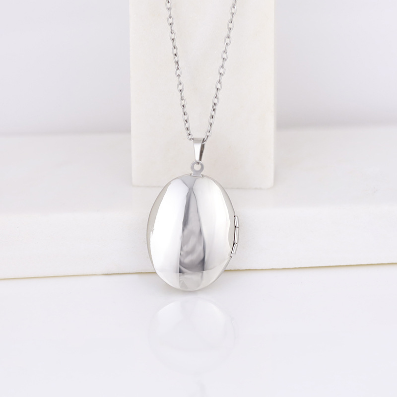 Vintage Silberfarbene Öffnbare – Heart Locket Necklace Photo Bewertung und Preis